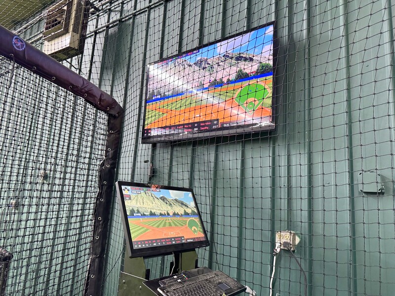 HitTrax dual-screen baseball and softball simulator